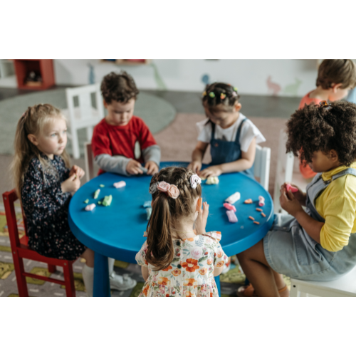 Children sitting around a table